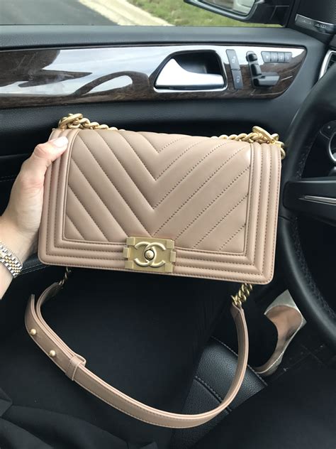 chanel beige medium bag with black hardware|large Chanel shoulder bag.